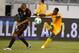 EAST RUTHERFORD, NJ - AUGUST 14: Serge Aurier #17 of Ivory Coast kicks the ball into Carlos Salcido #3 of Mexico during their match at MetLife Stadium on August 14, 2013 in East Rutherford, New Jersey. (Photo by Jeff Zelevansky/Getty Images)