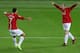 YOKOHAMA, JAPAN - DECEMBER 21: Wayne Rooney (R) of Manchester United celebrates scoring their first goal with teammate Cristiano Ronaldo during the FIFA Club World Cup Japan 2008 final match between Manchester United and Liga de Quito at the Internationa