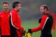 MANCHESTER, ENGLAND - OCTOBER 01: Wayne Rooney (R) and Robin van Persie of Manchester United talk during a training session ahead of their Champions League Group A match against Shakhtar Donetsk at their Carrington Training Complex on October 01, 2013 in