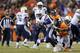 DENVER, CO - DECEMBER 12: Sylvester Williams #92 of the Denver Broncos sacks Philip Rivers #17 of the San Diego Chargers in the first quarter at Sports Authority Field at Mile High on December 12, 2013 in Denver, Colorado. (Photo by Justin Edmonds/Get