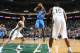 SALT LAKE CITY, UT - JANUARY 07: Reggie Jackson #15 of the Oklahoma City Thunder shoots against Trey Burke #3 and Derrick Favors #15 of the Utah Jazz at EnergySolutions Arena on January 07, 2014 in Salt Lake City, Utah. NOTE TO USER: User expressly ackno