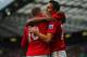 Wayne Rooney and Robin van Persie are the main strikers at Manchester United currently.