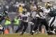 Jan 4, 2014; Philadelphia, PA, USA; New Orleans Saints running back Mark Ingram (22) carries the ball during the fourth quarter against the Philadelphia Eagles during the 2013 NFC wild card playoff football game at Lincoln Financial Field. The Saints defe