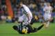 MADRID, SPAIN - JANUARY 06: Karim Benzema (L) of Real Madrid CF battles for the ball against Fabian Orellana of RC Celta de Vigo during the La Liga match between Real Madrid CF and RC Celta de Vigo at the Santiago Bernabeu stadium on January 6, 2014 in