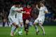 MADRID, SPAIN - JANUARY 09: Alvaro Cejudo (2ndL) of CA Osasuna competes for the ball with Pepe (L) of Real Madrid CF and his teammate Asier Illarramendi (R) during the Copa del Rey Round of 8 first match between Real Madrid and CA Osasuna at Estadio Santi