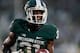 EAST LANSING, MI - NOVEMBER 02: Darqueze Dennard #31 of the Michigan State Spartans celebrates his fourth-quarter interception against the Michigan Wolverines at Spartan Stadium on November 2, 2013 in East Lansing, Michigan. Michigan State won the game 2