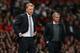MANCHESTER, ENGLAND - AUGUST 26: Manchester United Manager David Moyes and Chelsea Manager Jose Mourinho (R) look on during the Barclays Premier League match between Manchester United and Chelsea at Old Trafford on August 26, 2013 in Manchester, England.