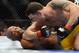 Dec 28, 2013; Las Vegas, NV, USA; Chris Weidman (red gloves) and Anderson Silva (blue gloves) fight during their UFC middleweight championship bout at the MGM Grand Garden Arena. Weidman won. Mandatory Credit: Jayne Kamin-Oncea-USA TODAY Sports