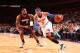 NEW YORK, NY - JANUARY 9: Carmelo Anthony #7 of the New York Knicks drives against LeBron James #6 of the Miami Heat during a game at Madison Square Garden in New York City on January 9, 2014. NOTE TO USER: User expressly acknowledges and agrees that, by