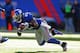 EAST RUTHERFORD, NJ - DECEMBER 30: Stevie Brown #27 of the New York Giants intercepts the ball against the Philadelphia Eagles during their game against the at MetLife Stadium on December 30, 2012 in East Rutherford, New Jersey. (Photo by Al Bello/Getty