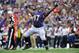 BALTIMORE, MD - SEPTEMBER 22: Defensive end Arthur Jones #97 of the Baltimore Ravens celebrates a sack against the Houston Texans at M&T Bank Stadium on September 22, 2013 in Baltimore, Maryland. The Ravens defeated the Texans 30-9. (Photo by Larry Frenc