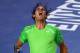 MELBOURNE, AUSTRALIA - JANUARY 29: Rafael Nadal of Spain celebrates winning set point in his men's final match against Novak Djokovic of Serbia during day fourteen of the 2012 Australian Open at Melbourne Park on January 29, 2012 in Melbourne, Australia.