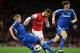 LONDON, ENGLAND - OCTOBER 29: Jack Wilshere of Arsenal is tackled by Kevin De Bruyne of Chelsea (L) during the Capital One Cup Fourth Round match between Arsenal and Chelsea at the Emirates Stadium on October 29, 2013 in London, England. (Photo by Jamie