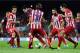 BARCELONA, SPAIN - AUGUST 28: Lionel Messi of FC Barcelona duels for the ball among Atletico de Madrid players during the Spanish Super Cup second leg match between FC Barcelona and Atletico de Madrid at Nou Camp on August 28, 2013 in Barcelona, Spain.