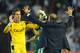 SEVILLE, SPAIN - NOVEMBER 24: Adrian San Miguel of Real Betis Balompie celebrates with his head coach Pepe Mel after Betis beat Real 1-0 during the La Liga match between Real Betis Balompie and Real Madrid CF at Estadio Benito Villamarin on November 24, 2