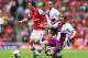 LONDON, ENGLAND - AUGUST 17: Tomas Rosicky of Arsenal is tackled by Andreas Weimann of Aston Villa during the Barclays Premier League match between Arsenal and Aston Villa at Emirates Stadium on August 17, 2013 in London, England. (Photo by Clive Mason/G