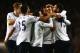 LONDON, ENGLAND - DECEMBER 29: Mousa Dembele of Tottenham Hotspur is mobbed by team mates after scoring his team's second goal during the Barclays Premier League match between Tottenham Hotspur and Stoke City at White Hart Lane on December 29, 2013 in Lo