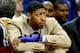 Dec 4, 2013; New Orleans, LA, USA; New Orleans Pelicans power forward Anthony Davis out with a hand fracture watches from the bench during the second half of a game against the Dallas Mavericks at New Orleans Arena.The Mavericks defeated the Pelicans 100-