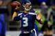 SEATTLE, WA - DECEMBER 02: Quarterback Russell Wilson #3 of the Seattle Seahawks passes against the New Orleans Saints during a game at CenturyLink Field on December 2, 2013 in Seattle, Washington. (Photo by Jonathan Ferrey/Getty Images)