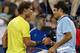 CINCINNATI, OH - AUGUST 16: (L-R) Rafael Nadal of Spain shakes hands at the net with Roger Federer of Switzerland after their Men's Singles quarterfinals match during the Western & Southern Open on August 16, 2013 at Lindner Family Tennis Center in Cinci