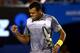 MELBOURNE, AUSTRALIA - JANUARY 23: Jo-Wilfred Tsonga of France celebrates winning a point in his Quarterfinal match against Roger Federer of Switzerland during day ten of the 2013 Australian Open at Melbourne Park on January 23, 2013 in Melbourne, Austra