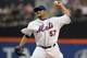 NEW YORK, NY - AUGUST 11: Johan Santana #57 of the New York Mets pitches in the first inning against the Atlanta Braves at Citi Field on August 11, 2012 in the Flushing neighborhood of the Queens borough of New York City. (Photo by Mike Stobe/Getty Image