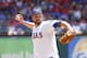 ARLINGTON, TX - JUNE 17: Colby Lewis #48 of the Texas Rangers delivers a pitch against the Houston Astros during an interleage game at Rangers Ballpark in Arlington on June 17, 2012 in Arlington, Texas. (Photo by Rick Yeatts/Getty Images)
