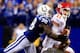 INDIANAPOLIS, IN - JANUARY 04: Outside linebacker Robert Mathis #98 of the Indianapolis Colts forces a fumble by quarterback Alex Smith #11 of the Kansas City Chiefs during a Wild Card Playoff game at Lucas Oil Stadium on January 4, 2014 in Indianapolis,