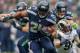 SEATTLE, WA - DECEMBER 29: Running back Marshawn Lynch #24 of the Seattle Seahawks rushes against the St. Louis Rams at CenturyLink Field on December 29, 2013 in Seattle, Washington. (Photo by Otto Greule Jr/Getty Images)