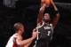 NEW YORK, NY - JANUARY 10: Kevin Garnett #2 of the Brooklyn Nets shoots against Chris Bosh #1 of the Miami Heat during a game at the Barclays Center on January 10, 2014 in the Brooklyn borough of New York City. NOTE TO USER: User expressly acknowledges a