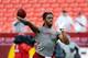 Dec 22, 2013; Landover, MD, USA; Washington Redskins quarterback Robert Griffin III (10) warms up before the game against the Dallas Cowboys at FedEx Field. Mandatory Credit: Brad Mills-USA TODAY Sports