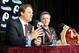 Jan 9, 2014; Ashburn, VA, USA; Washington Redskins head coach Jay Gruden speaks as general manager Bruce Allen looks on during a press conferences at Redskins Park Team Auditorium. Mandatory Credit: Brad Mills-USA TODAY Sports