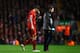 LIVERPOOL, ENGLAND - JANUARY 05: Daniel Agger of Liverpool goes off to receive treatment during the Budweiser FA Cup third round match between Liverpool and Oldham Athletic at Anfield on January 5, 2014 in Liverpool, England. (Photo by Clive Mason/Getty