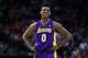 Jan 8, 2014; Houston, TX, USA; Los Angeles Lakers small forward Nick Young (0) reacts to a fan during the third quarter against the Houston Rockets at Toyota Center. Mandatory Credit: Andrew Richardson-USA TODAY Sports