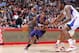 LOS ANGELES, CA - DECEMBER 30: Eric Bledsoe #2 of the Phoenix Suns drives to the basket against DeAndre Jordan #6 of the Los Angeles Clippers at STAPLES Center on December 30, 2013 in Los Angeles, California. NOTE TO USER: User expressly acknowledges and