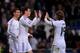MADRID, SPAIN - JANUARY 06: Gareth Bale (C) and Luka Modric celebrate after Cristiano Ronaldo (L) scored Real's 3rd goal during the La Liga match between Real Madrid CF and RC Celta de Vigo at the Santiago Bernabeu stadium on January 6, 2014 in Madrid, S