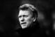 HULL, ENGLAND - DECEMBER 26: (EDITORS NOTE: THIS BLACK AND WHITE IMAGE WAS CREATED FROM ORIGINAL COLOUR FILE) Manchester United manager David Moyes shouts instructions on the touchline during the Barclays Premier League match between Hull City and Manche