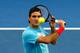 MELBOURNE, AUSTRALIA - JANUARY 11: Roger Federer of Switzerland practices ahead of the 2014 Australian Open at Melbourne Park on January 11, 2014 in Melbourne, Australia. (Photo by Darrian Traynor/Getty Images)