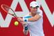 MELBOURNE, AUSTRALIA - JANUARY 10: Andy Murray of Great Britain plays a backhand during his match against Lleyton Hewitt of Australia during day three of the AAMI Classic at Kooyong on January 10, 2014 in Melbourne, Australia. (Photo by Scott Barbour/Ge