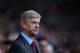 LONDON, ENGLAND - DECEMBER 26: Arsene Wenger manager of Arsenal looks on prior to the Barclays Premier League match between West Ham United and Arsenal at Boleyn Ground on December 26, 2013 in London, England. (Photo by Bryn Lennon/Getty Images)
