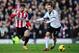 LONDON, ENGLAND - JANUARY 11: Fabio Borini (L) of Sunderland and Sascha Riether (R) of Fulham during the Barclays Premier League match between Fulham and Sunderland at Craven Cottage on January 11, 2014 in London, England. (Photo by Jamie McDonald/Getty
