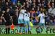 CARDIFF, WALES - JANUARY 11: West Ham player Carlton Cole (l) is congratulated after opening the scoring during the Barclays Premier League match between Cardiff City and West Ham United at Cardiff City Stadium on January 11, 2014 in Cardiff, Wales. (P