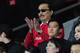 CARDIFF, WALES - DECEMBER 28: Cardiff owner Vincent Tan (c) looks on before the Barclays Premier League match between Cardiff City and Sunderland at Cardiff City Stadium on December 28, 2013 in Cardiff, Wales. (Photo by Stu Forster/Getty Images)