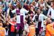 LONDON, ENGLAND - AUGUST 17: Christian Benteke of Aston Villa (L) celebrates scoring his side's second goal from the penalty spot with team mate Antonio Luna during the Barclays Premier League match between Arsenal and Aston Villa at Emirates Stadium on