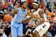 Jan 11, 2014; Syracuse, NY, USA; North Carolina Tar Heels guard Leslie McDonald (2) controls the ball against the defense of Syracuse Orange forward C.J. Fair (5) at the Carrier Dome. Mandatory Credit: Rich Barnes-USA TODAY Sports