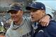 Jan 5, 2014; Cincinnati, OH, USA; San Diego Chargers coach Mike McCoy (left) embraces offensive coordinator Ken Whisenhunt after the 2013 AFC wild card playoff football game against the Cincinnati Bengals at Paul Brown Stadium. Mandatory Credit: Kirby Lee
