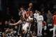 Jan 10, 2014; Brooklyn, NY, USA; Miami Heat small forward LeBron James (6) shoots over Brooklyn Nets small forward Andrei Kirilenko (47) during the second half at Barclays Center. The Brooklyn Nets won the game 104-95 in double overtime. Mandatory Credit: