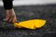 SEATTLE, WA - DECEMBER 12: An official picks up a penalty flag during a game between the St. Louis Rams and the Seattle Seahawks at CenturyLink Field December 12, 2011 in Seattle, Washington. Seattle won 33-13. (Photo by Jay Drowns/Getty Images)