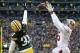 Jan 5, 2014; Green Bay, WI, USA; San Francisco 49ers wide receiver Michael Crabtree (15) attempts to make a catch as Green Bay Packers cornerback Davon House (31) defends during the first quarter of the 2013 NFC wild card playoff football game at Lambeau