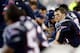FOXBORO, MA - JANUARY 11: Tom Brady #12 of the New England Patriots looks on from the bench against the Indianapolis Colts during the AFC Divisional Playoff game at Gillette Stadium on January 11, 2014 in Foxboro, Massachusetts. (Photo by Jim Rogash/Ge